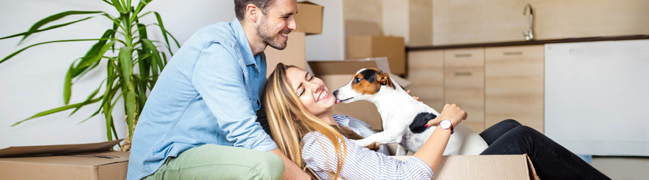 couple and dog moving in home.